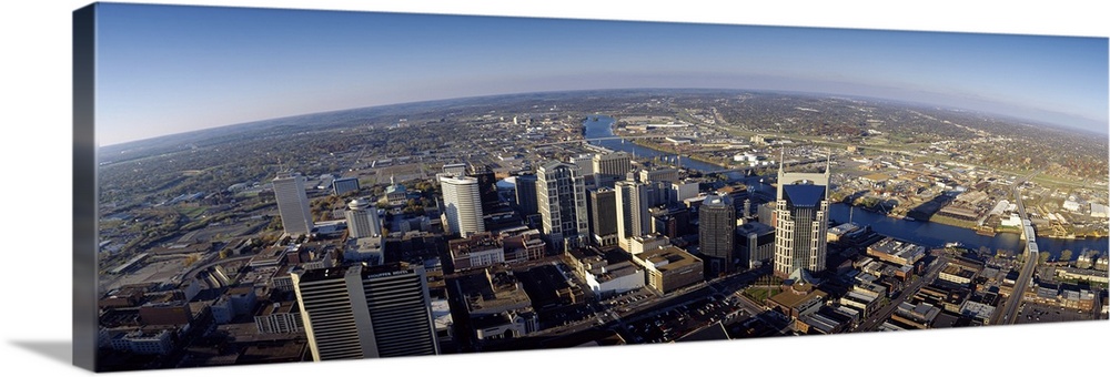 An aerial photograph taken in panoramic view of the city of Nashville during the day.