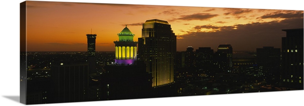 High angle view of buildings lit up at dusk, New Orleans, Louisiana
