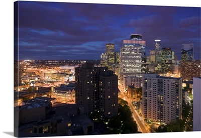 High angle view of buildings lit up at night, Minneapolis, Minnesota
