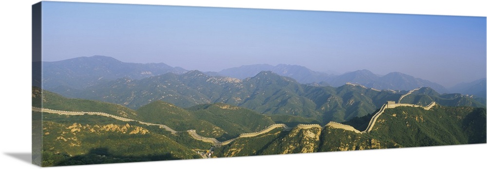 High angle panorama of the mountains and the Great Wall of China.