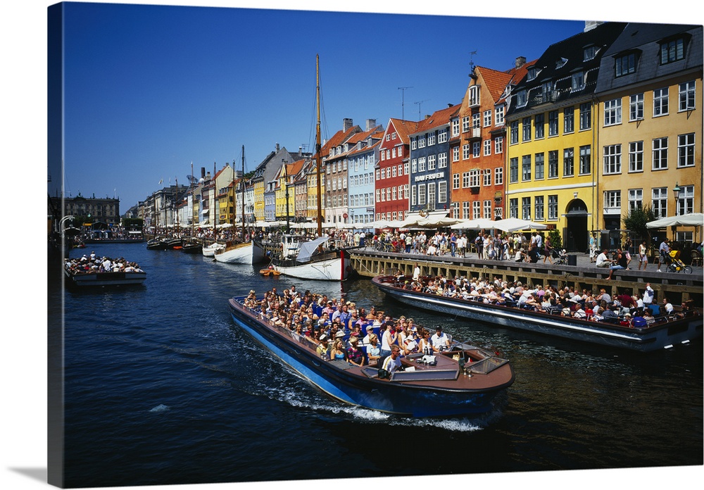 High angle view of tourists on a boat in a river, Nyhavn, Copenhagen, Denmark