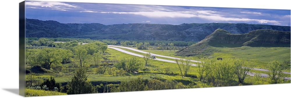 Highway passing through a landscape, Interstate 94, Badlands, Theodore Roosevelt National Park, North Dakota