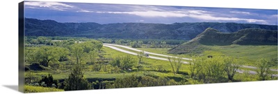 Highway passing through a landscape, Interstate 94, Badlands, Theodore Roosevelt National Park, North Dakota