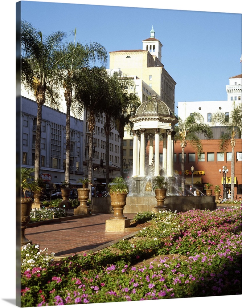 San Diego, California's Horton Plaza with flowers and palm trees.