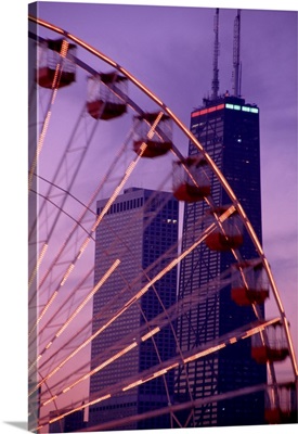 Illinois, Chicago, Ferris Wheel in evening at Navy Pier and view of Hancock Building