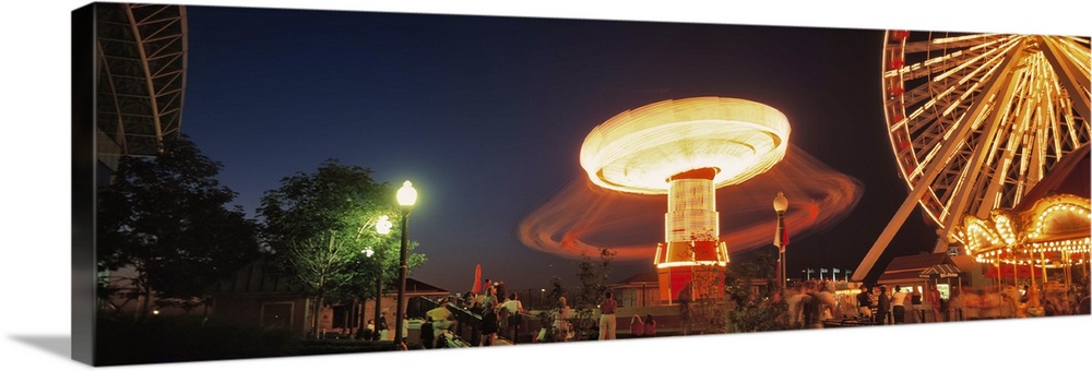 Illinois, Chicago, Navy Pier, Illuminated Ferris wheel in an amusement park