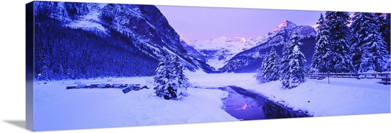 Lake in winter with mountains in the background Lake Louise Banff ...