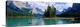 image thumbnail of A peninsula with a grove of conifer trees protrudes into this scenic body of water surrounded by mountains of the Canadian...