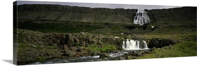 Landscape with waterfall and stream, Iceland