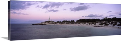Lighthouse at the waterfront, Bathurst Lighthouse, Pinkys Beach, Rottnest Island, Western Australia, Australia