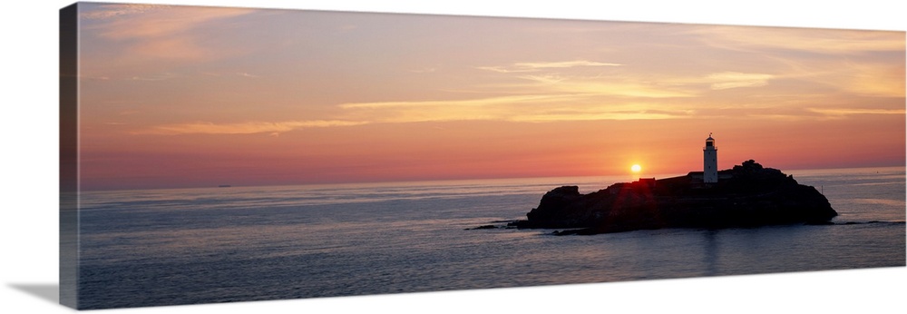 Lighthouse on an island in atlantic ocean, godrevy lighthouse, st ives, cornwall, england.