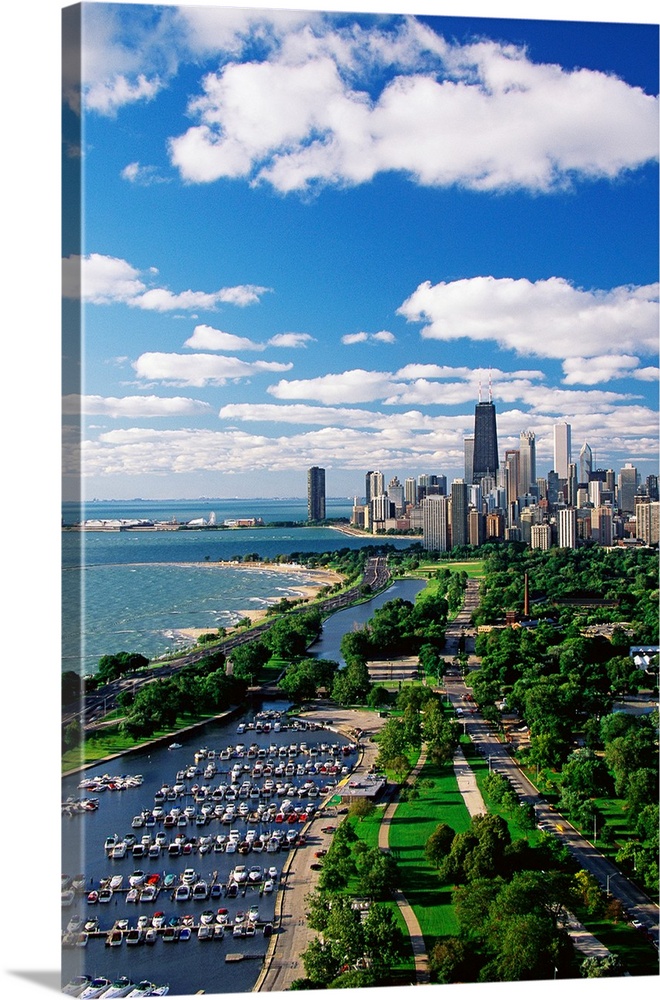 A vertical cityscape photograph of the urban areas along Lake Michigan.