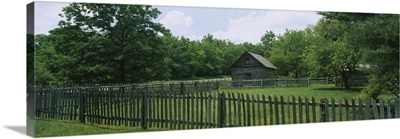 Log cabin surrounded by picket fence, Puckett Cabin, Blue Ridge Parkway, Virginia