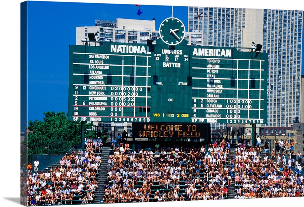 Long view of scoreboard and full bleachers during a professional baseball game, Wrigley Field, Illinois