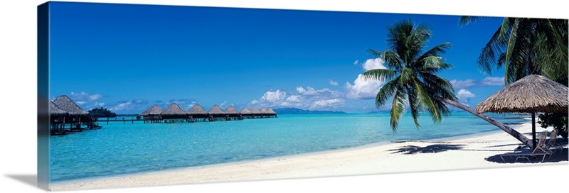 Lounge chair under a beach umbrella, Moana Beach, Bora Bora, French ...