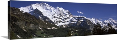 Low angle view of a mountain range Mt Jungfrau Lauterbrunnen Valley Wengen Bernese Oberland Berne Canton Switzerland