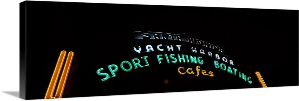 Low angle view of a neon signboard Santa Monica Pier Santa Monica Los Angeles County California