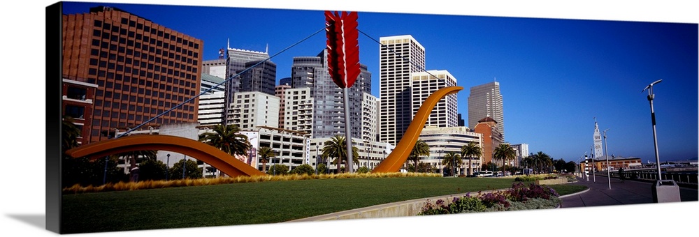 Low angle view of a sculpture in front of buildings, San Francisco, California