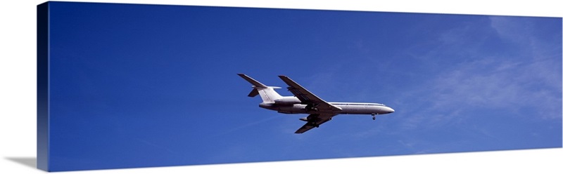 Low angle view of an airplane flying, Tupolev Tu-154 Wall Art, Canvas ...