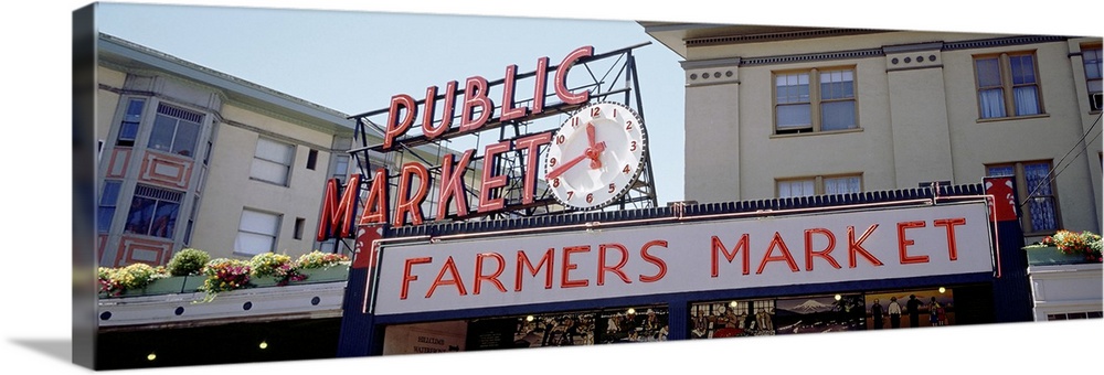 Long canvas print of the Farmer's Market sign in Seattle with the entrance seen below.