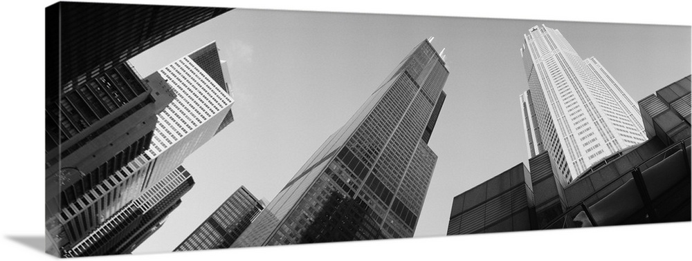 View from the bottom looking up at big buildings in Chicago on canvas.