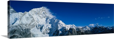 Low angle view of mountains covered with snow, Himalaya Mountains, Khumba Region, Nepal