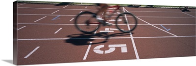 Low section view of a man cycling on sports track, Kirchzarten, Germany