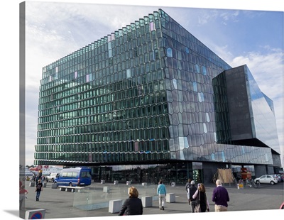 Modern cube glass building against cloudy sky, Harpa Concert Hall, Reykjavik, Iceland