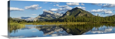 Mount Rundle and Sulphur Mountain reflecting in Vermilion Lake, Canada