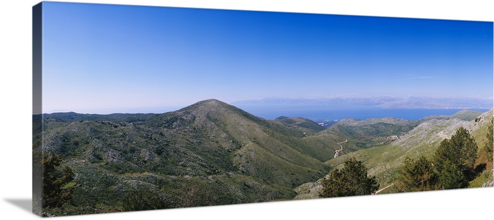 Mountain range with a sea in the background, Corfu, Ionian Islands, Greece