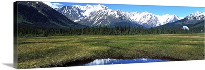 Mountain scene with lake, distant hotel, Moose Meadow, Alaska