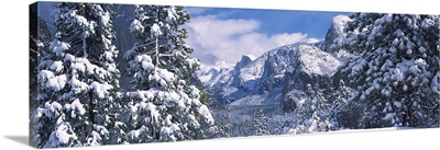 Mountains and waterfall in snow, Tunnel View, El Capitan, Half Dome, Bridal Veil, Yosemite National Park, California,