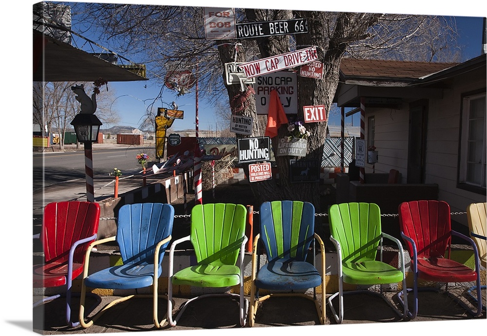 Multi-colored chairs at a sidewalk cafe, Route 66, Seligman, Yavapai County, Arizona, USA