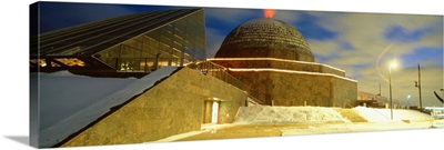 Museum lit up at dusk, Adler Planetarium, Chicago, Illinois