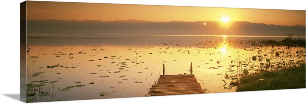 Myanmar, Inle Lake, View of the sunset and pier