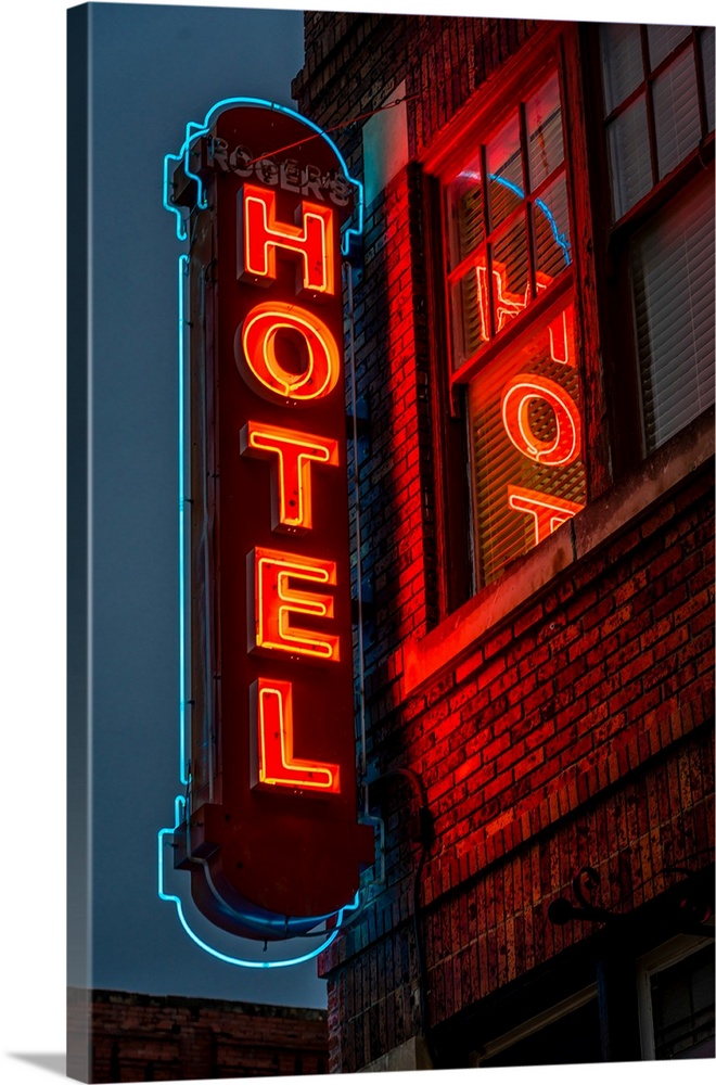 Neon sign for "hotel" in texas.