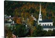 image thumbnail of Large photo of fall foliage surrounding a small town in Vermont with an old Church on the right.