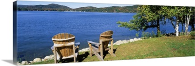 New York, Adirondack State Park, Adirondack Mountains, Fourth Lake, Adirondack Chairs on a lawn