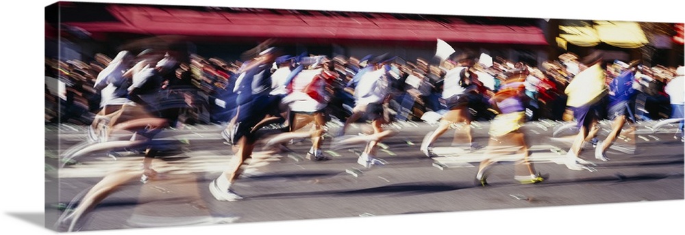 This panoramic shot is taken of runners in motion during a marathon so everyone appears blurry.