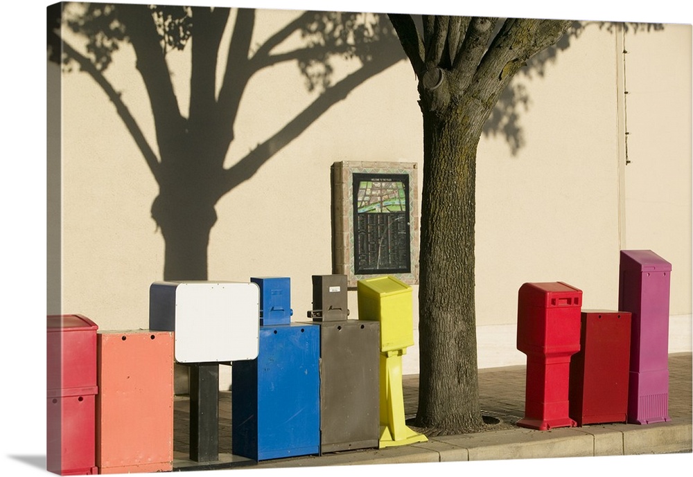 Newspaper boxes in a row at a footpath, Country Club Plaza, Kansas City, Missouri