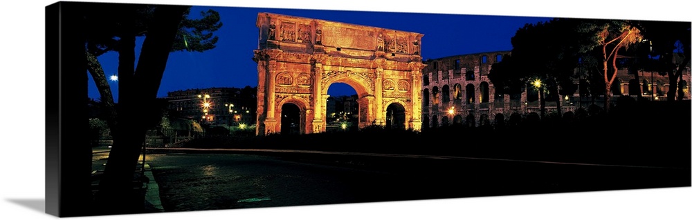 Panorama of the Roman Colosseum and Constantine's Arch in Rome, Italy.