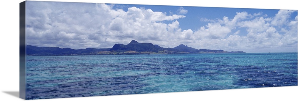 Ocean with mountains in the background Mauritius