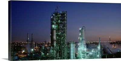 Oil refinery illuminated at night, Los Angeles, California