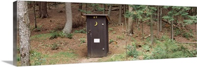 Outhouse in a forest, Adirondack Mountains, New York State,