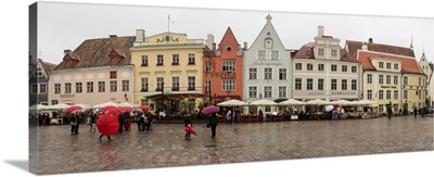 People at town square in rainy season, Tallinn, Estonia