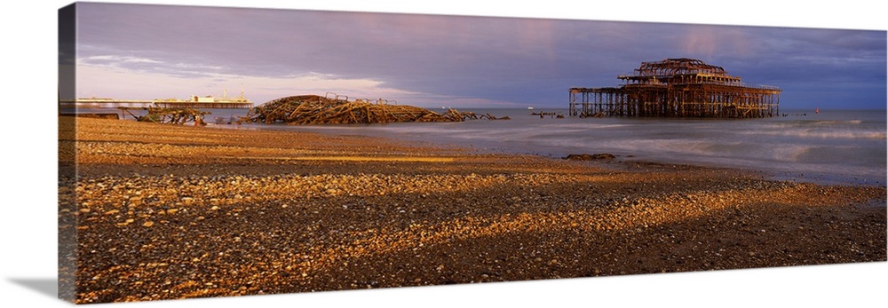 Pier on the beach at sunset West Pier Brighton East Sussex England