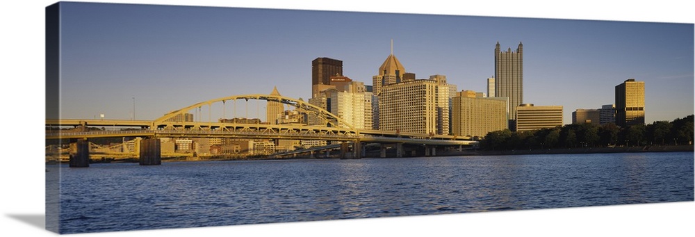 Giant, panoramic photograph of the Pittsburgh skyline, and the Fort Pitt Bridge in the foreground, over the Monongahela Ri...