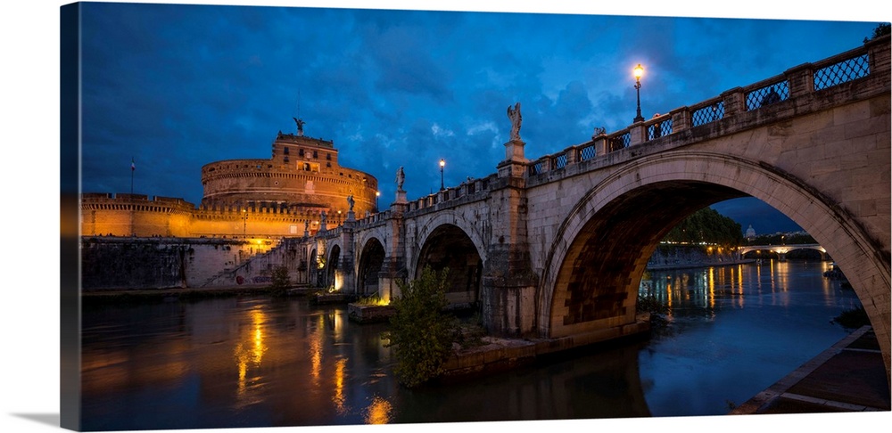 Ponte Sant'Angelo over river with Hadrian's Tomb in the background, Rome, Lazio, Italy.
