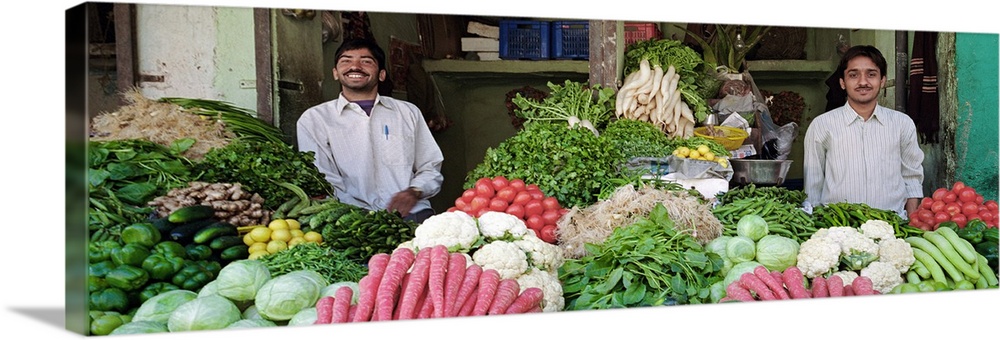 Portrait of two grocers smiling, Nagaur, Rajasthan, India