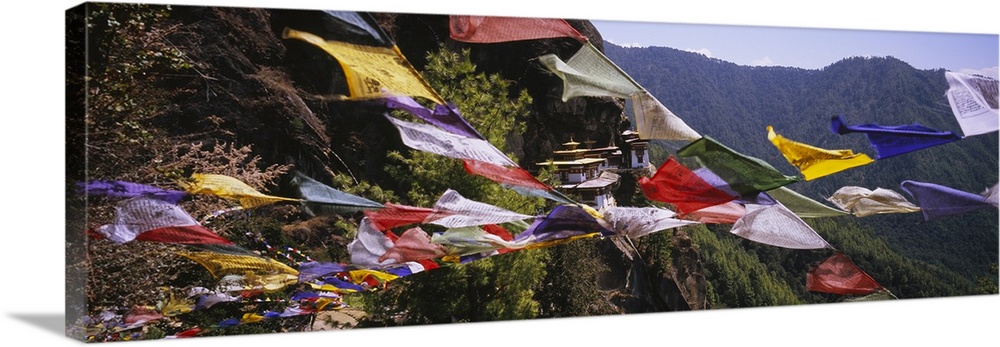 Prayer flags in front of a monastery on a mountain, Taktshang, Paro Valley, Bhutan